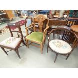 Three Victorian and later chairs with embroidered seats plus an oak carver chair