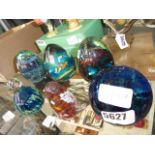 Six paperweights