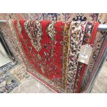 Red mat with floral pattern