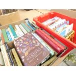 Three boxes containing novels and reference books