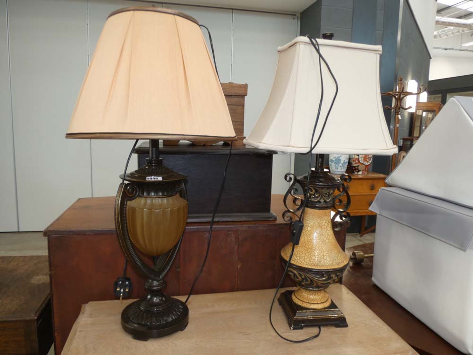 Two urn shaped table lamps with shades