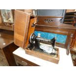 Cased sewing machine
