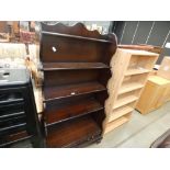 Dark walnut waterfall fronted bookcase with two drawers under