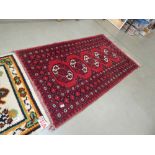 Red bukhara style carpet