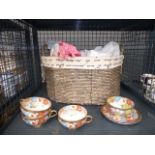 A cage containing a floral patterned Japanese export tea service (AF)