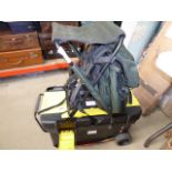 A canvas fisherman's folding seat, plus a tackle box