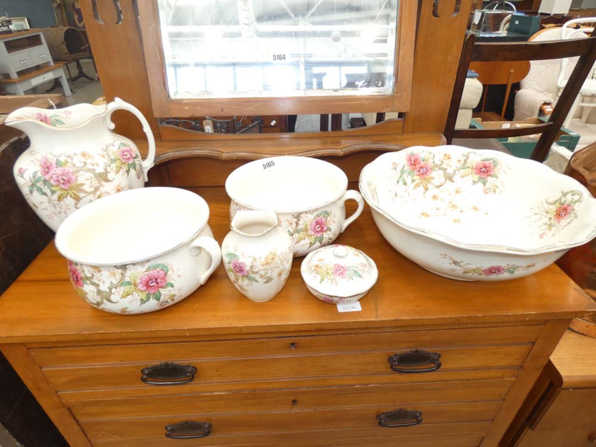 Floral patterned washstand, jug and bowl set plus two chamber pots