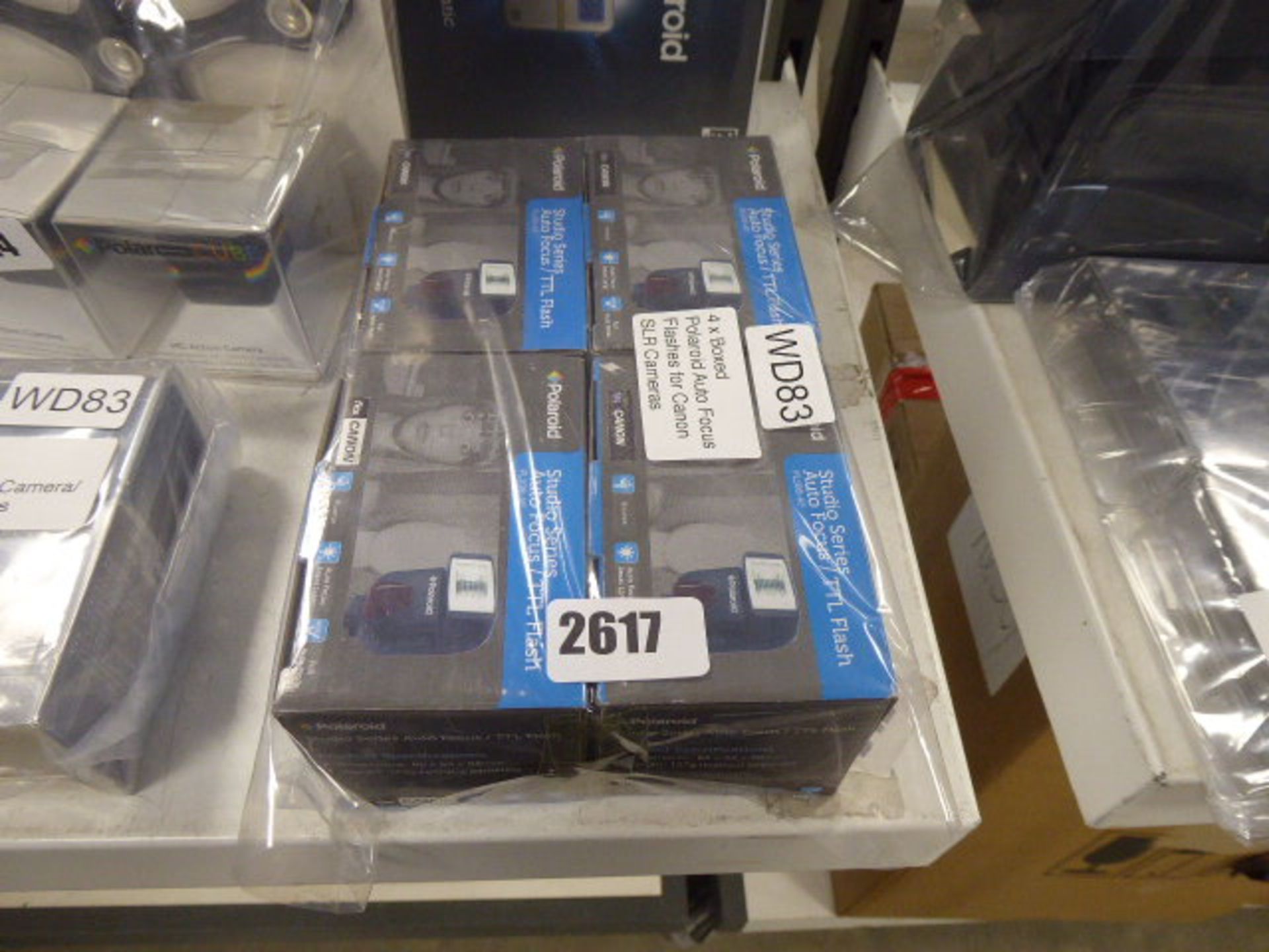 4 boxed Polaroid auto focus flashes for SLR cameras