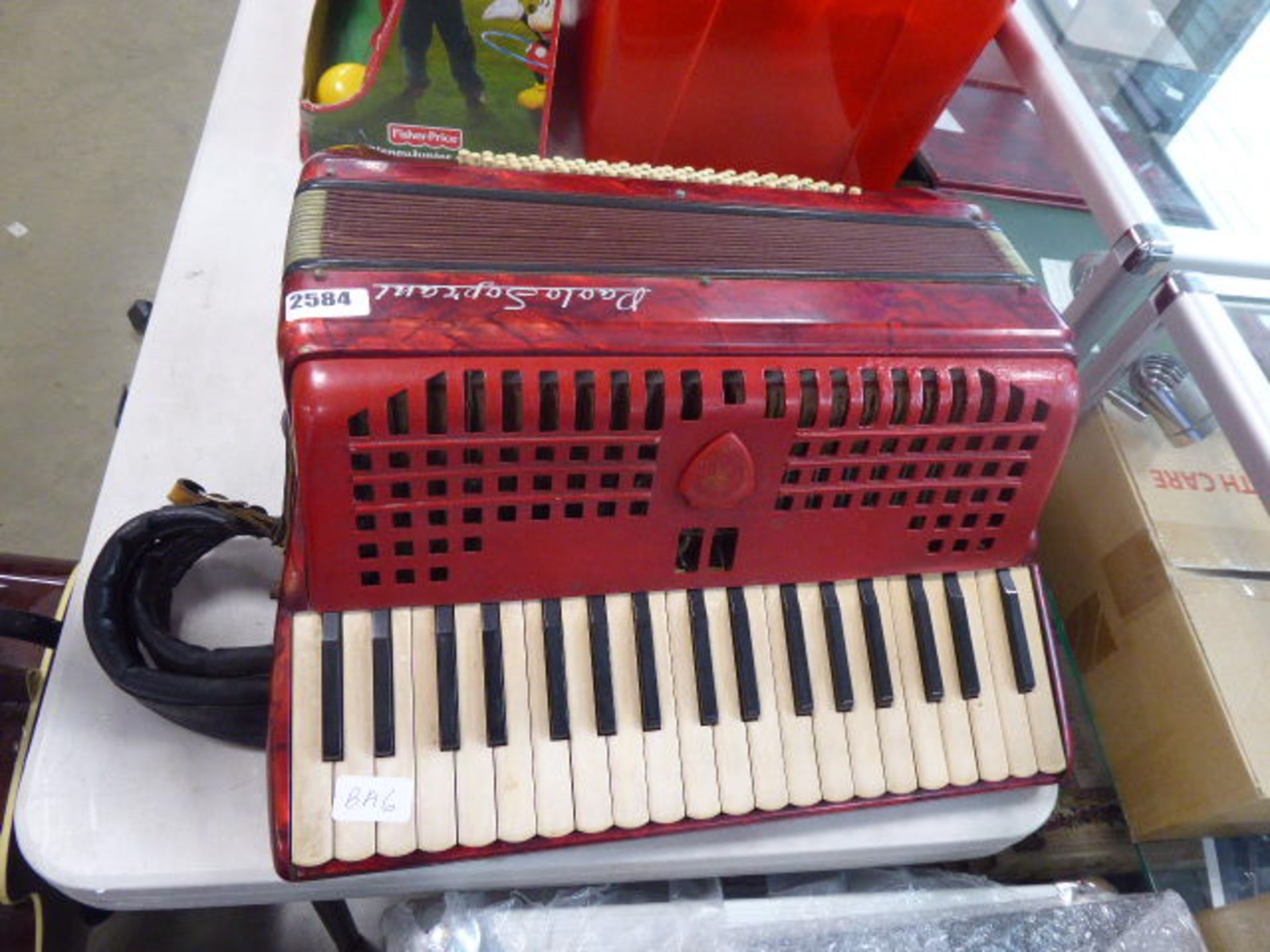 Paolo soprni piano accordion in red with leather strap