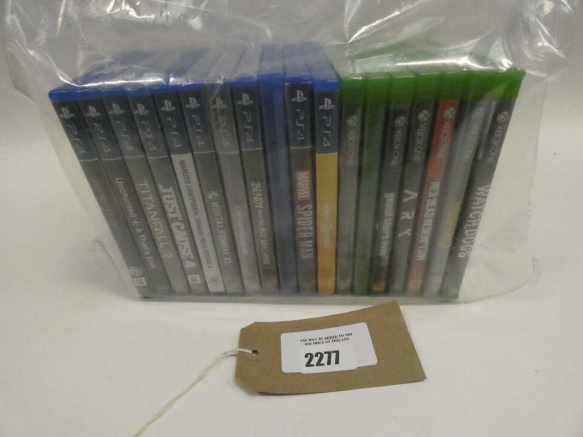 Bag containing 11x PS4 games and 7x Xbox One games