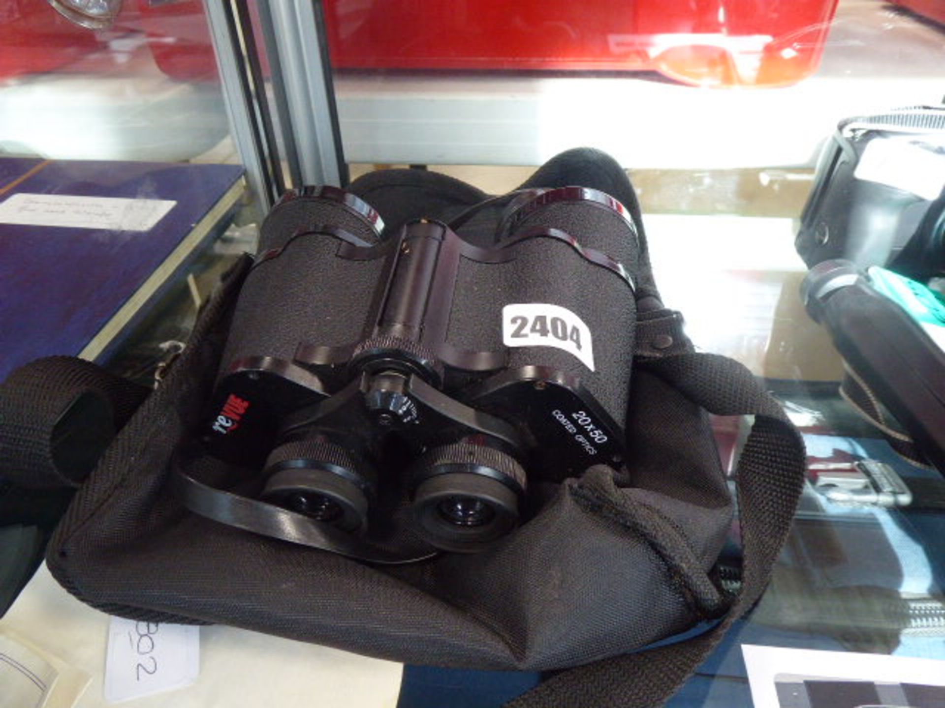 Pair of Rebue 20 x 50 binoculars with soft carry case