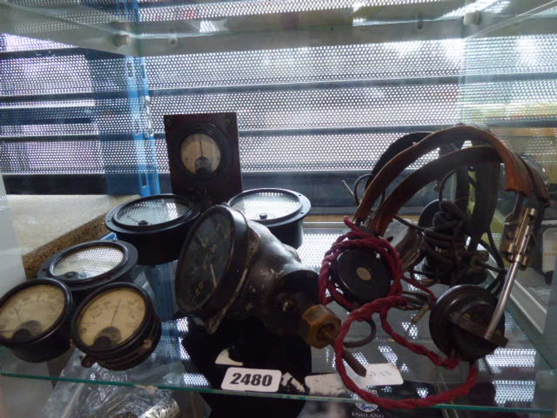 Selection of various voltmeter dials including military stamps and 3 pairs of vintage military