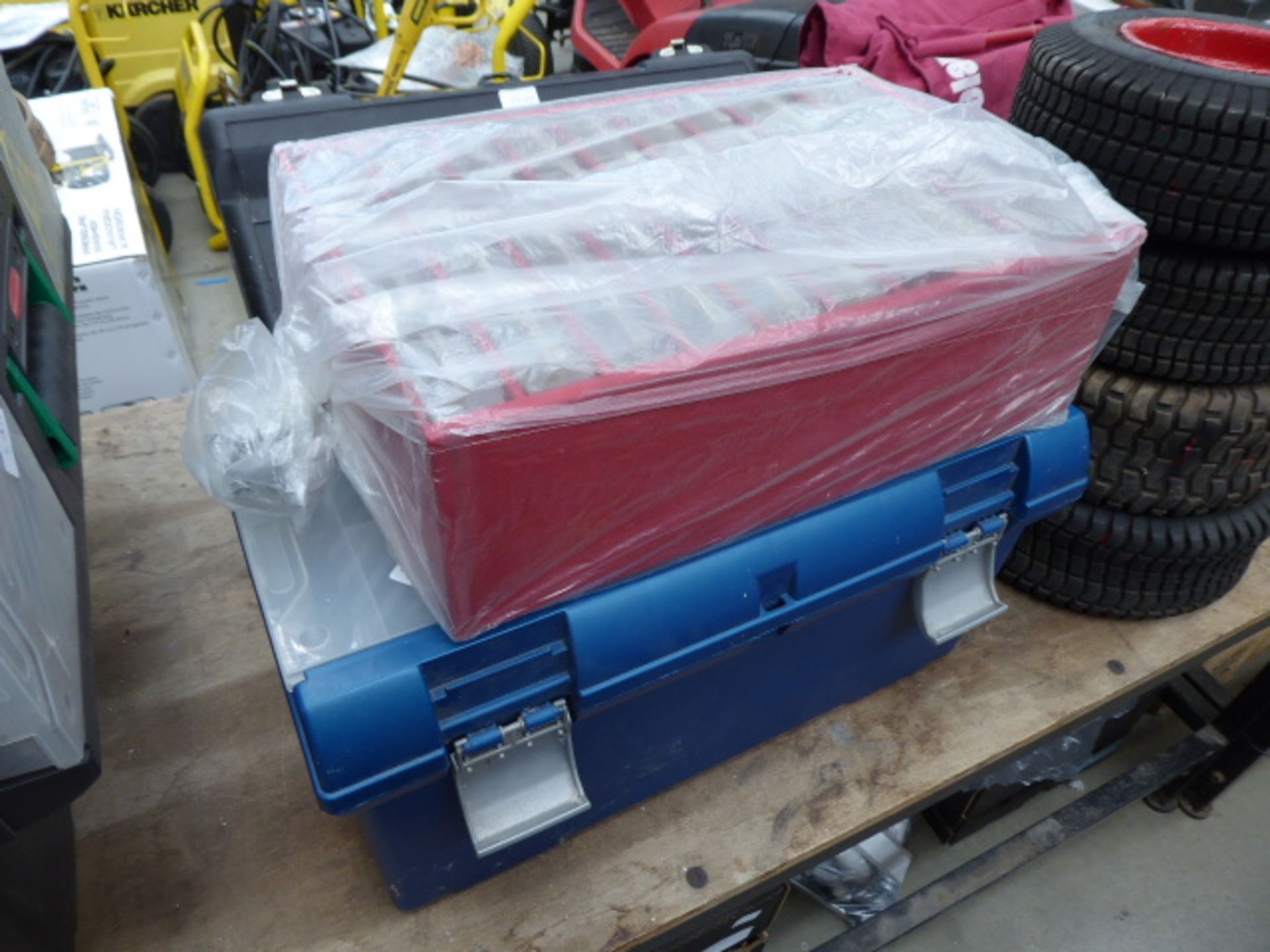 Blue Curver tool box and a red parts box