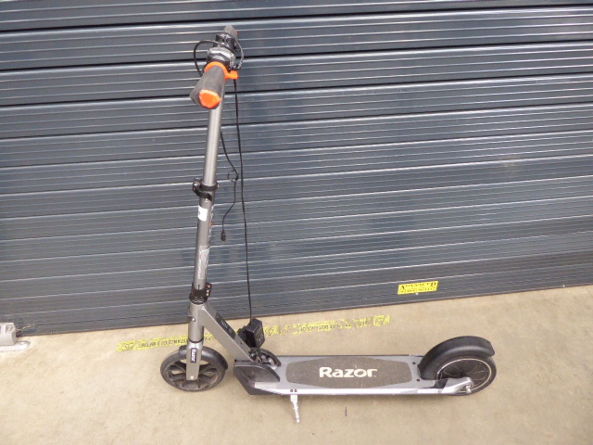 Razor electric scooter in grey with charger