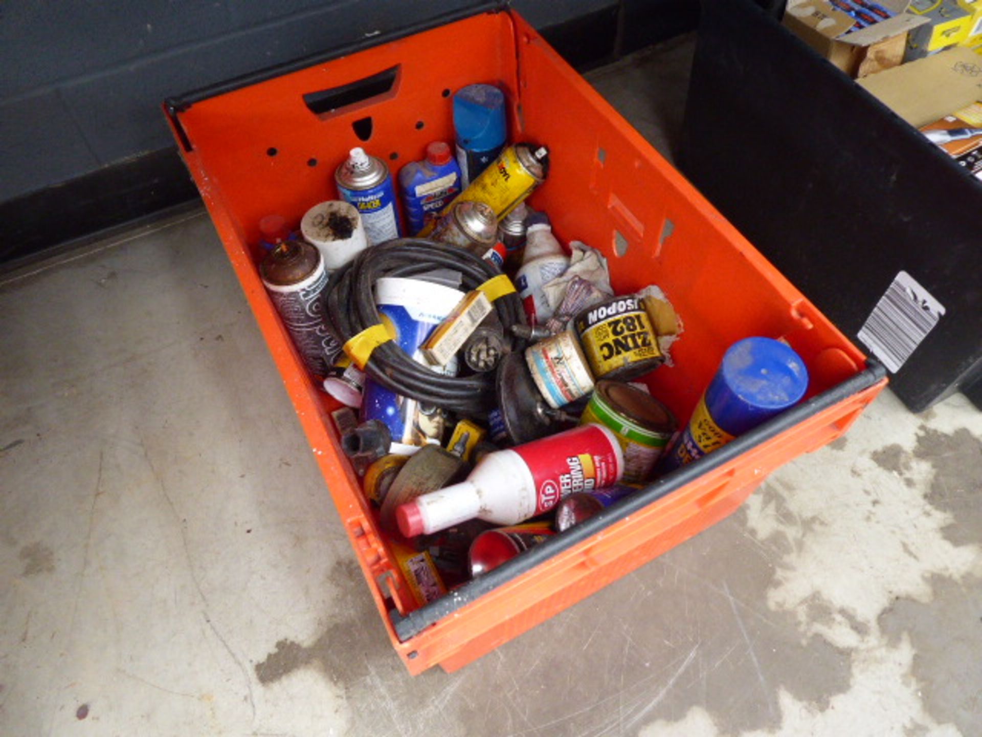 Box containing quantity of de-icer and car chemicals