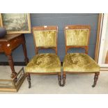 Pair of upholstered bedroom chairs on casters (collector's item, see soft furnishings policy