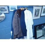 A crochet lady's dress, a blue Surge coat, a brown sheepskin jacket, plus an Aquascutum coat