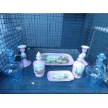 (1) A cage containing glass sauce bottles, plus a pink glazed dressing table tidy