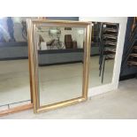 Heavy gold finished bevelled mirror
