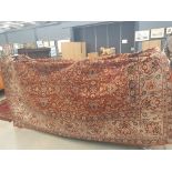 Large red floral carpet, 3.5 x 2.5m