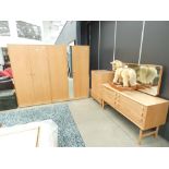 Oak 1950s bedroom suite comprising a pair of wardrobes, chest of 5 drawers, and a dressing table