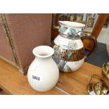 Floral glazed ceramic jug with similar vase