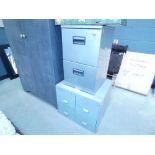 Two sets of metal filing cabinets