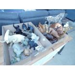 2 boxes containing pottery and resin and wooden animal figures