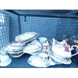 Cage containing ornamental figure, general crockery, china and a tea pot