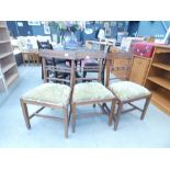 5324 - Three mahogany dining chairs with fabric drop-in seats