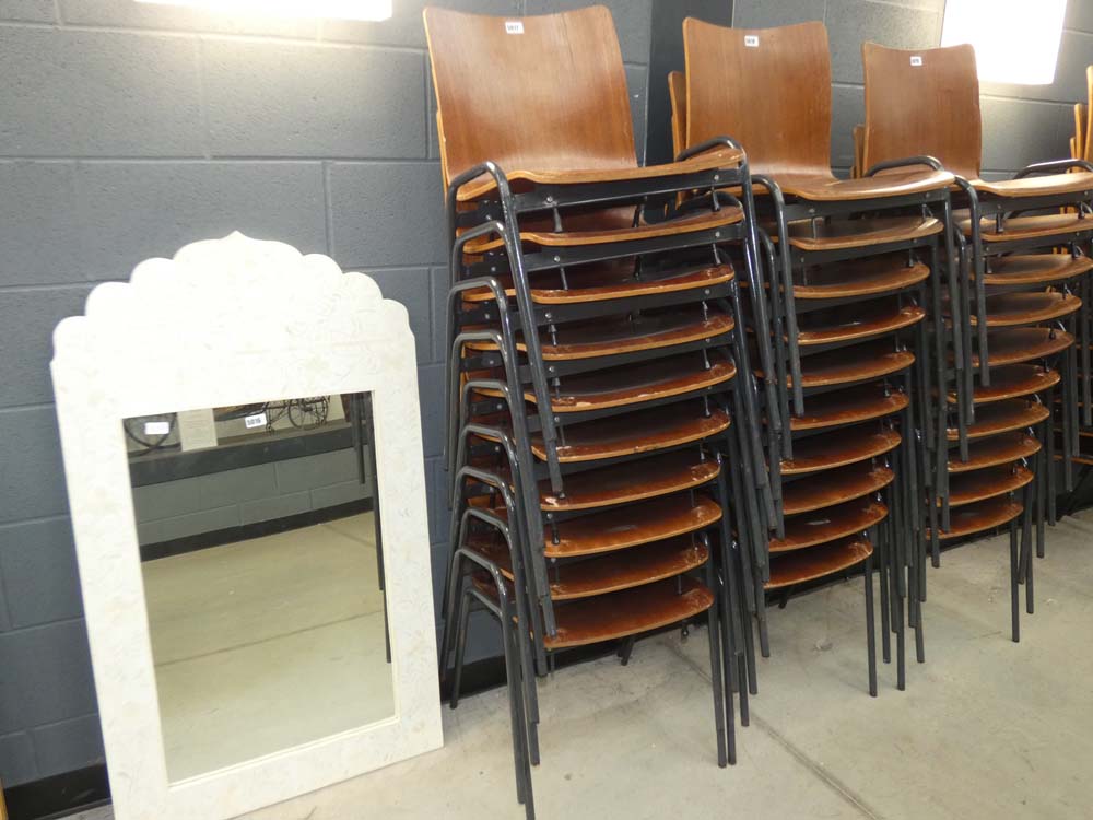 Stack of 10 bent wood chairs on metal frames