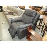 Brown upholstered reclining armchair