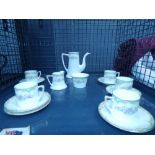 (3) Cage containing a noritake flower patterned tea servers