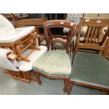 A pair of mahogany Victorian dining chairs, with green fabric seats