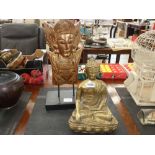 Brass Buddha figurine with similar wooden icon