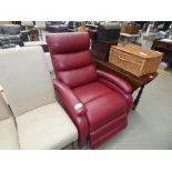 5136 - A red leather effect reclining armchair