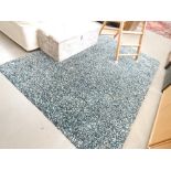 Blue flecked carpet
