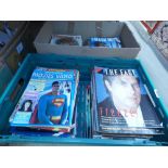 Two boxes containing music magazines