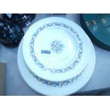 Stack of Wedgwood Sandringham patterned plates