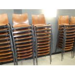 Stack of 10 bent wood chairs on metal frames