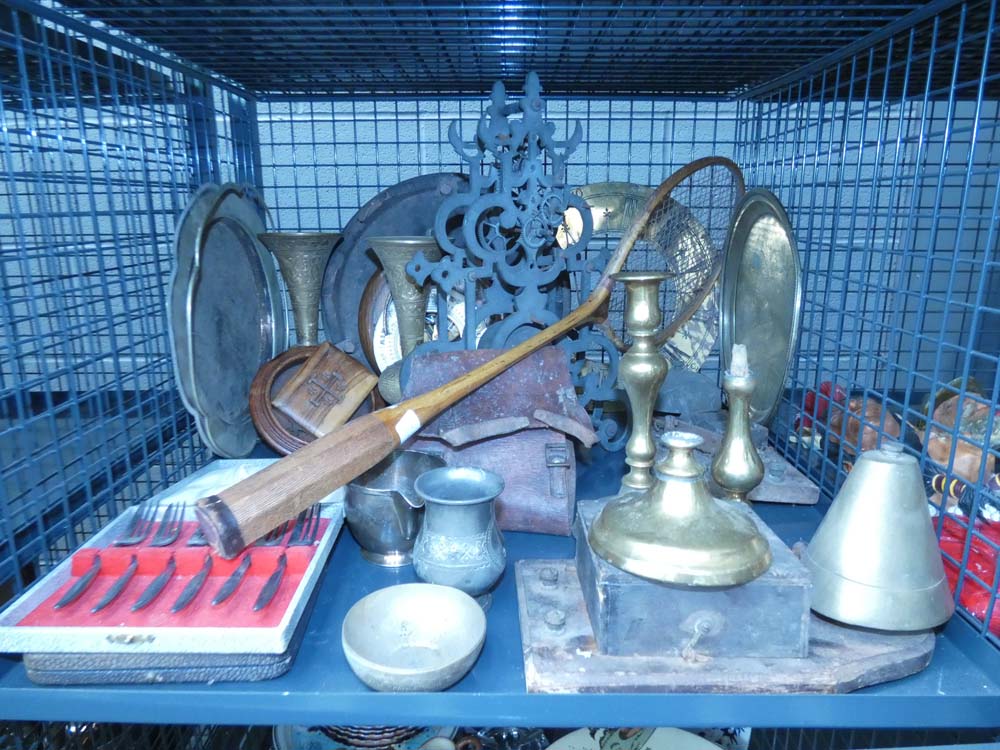 A cage containing a vintage badminton racquet, boxed cutlery sets, treen, barometer, plus brass