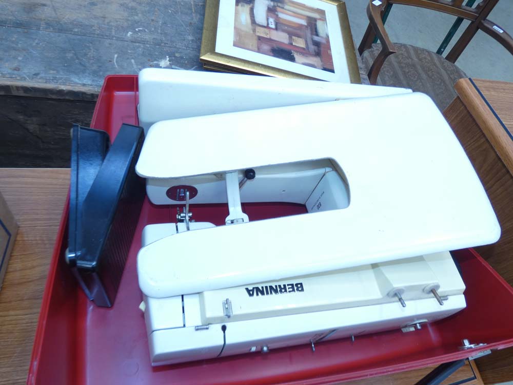 A cased Burnina sewing machine