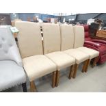 Four oatmeal fabric dining chairs