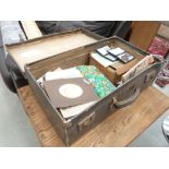 Vintage suitcase with newspaper cuttings nursing service medals photographs and general ephemera