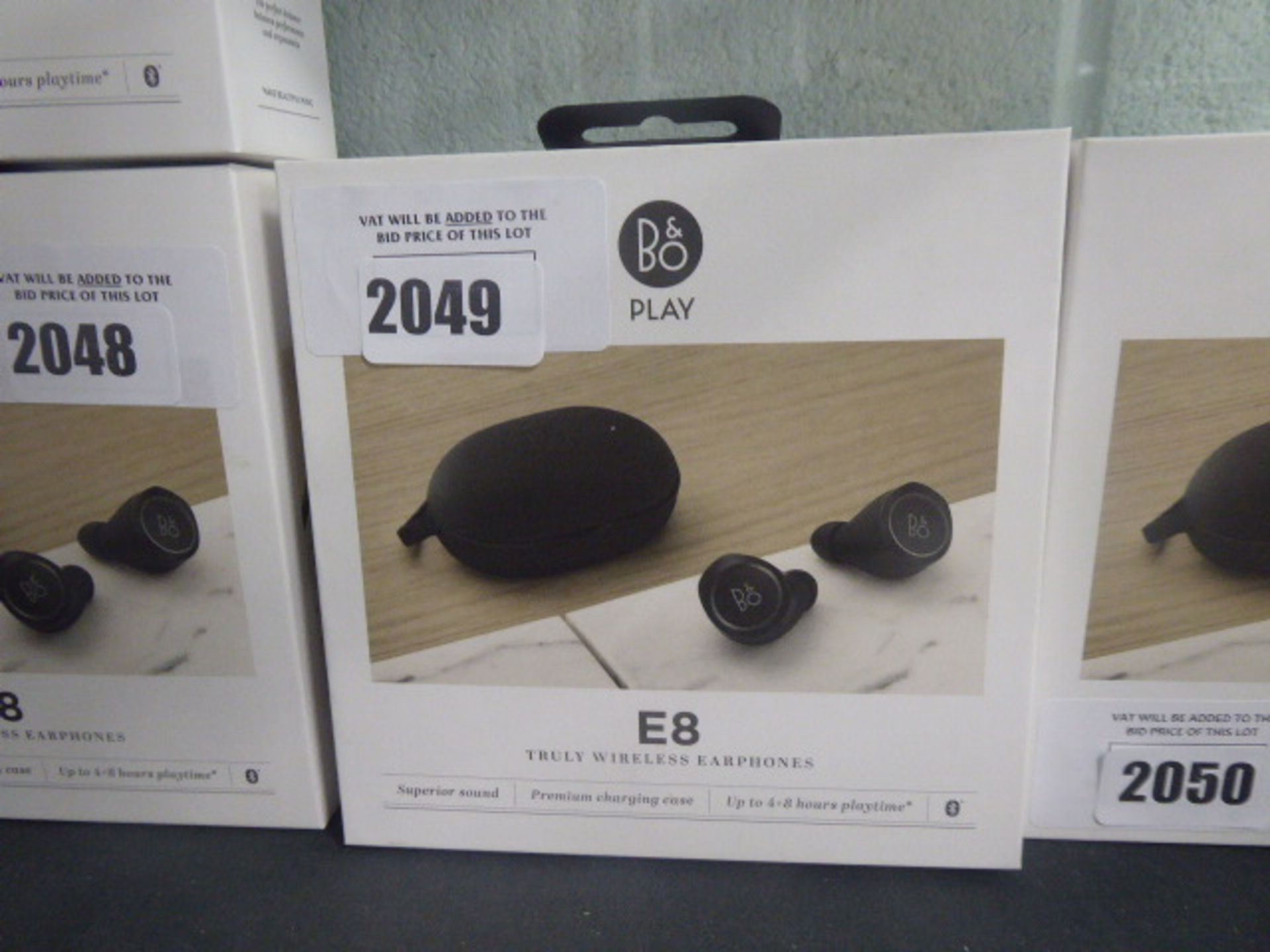 Bang & Olufsen Beoplay B8 wireless earphones with spare eartips, charging case and box