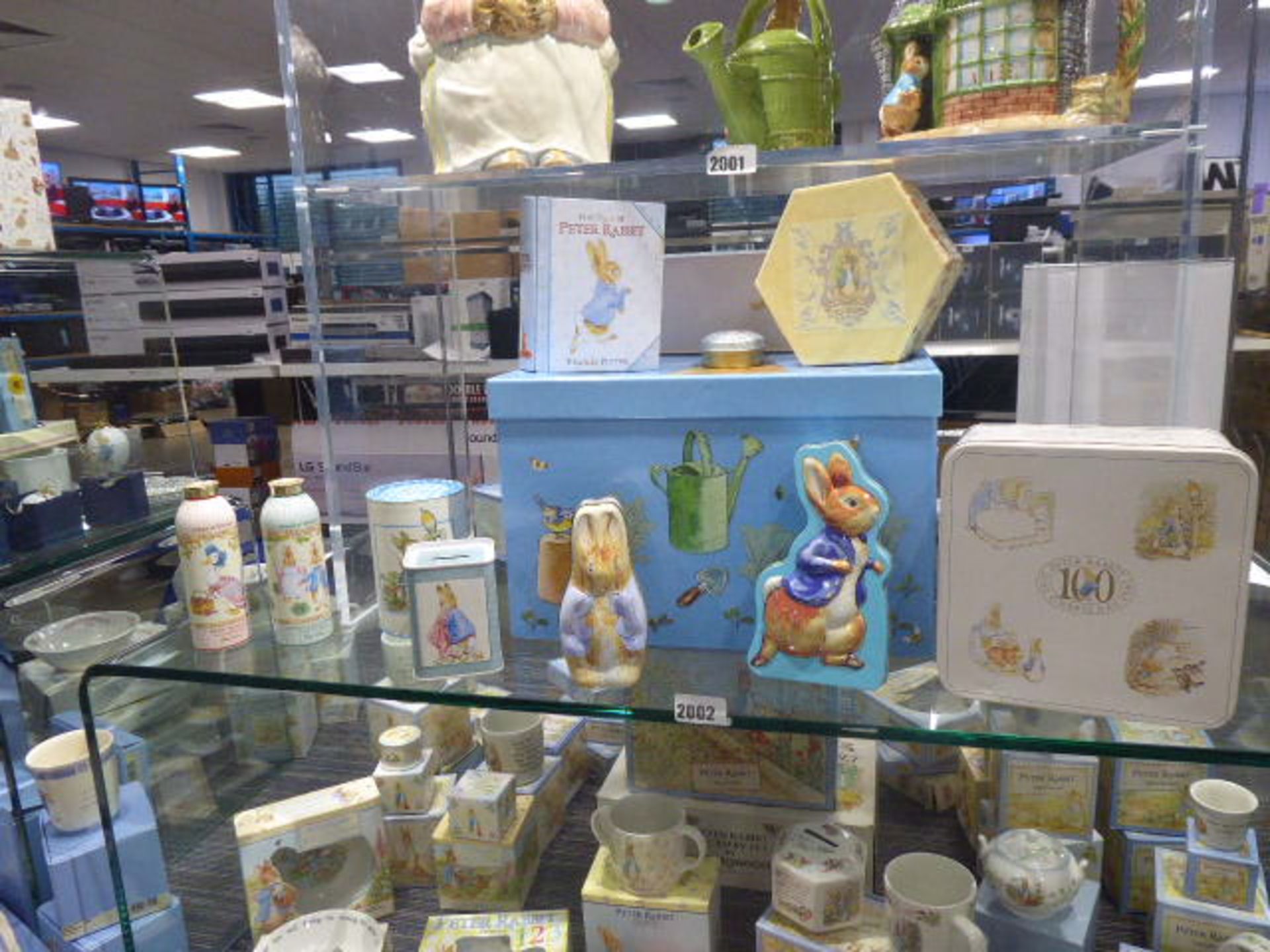 Various Beatrix Potter themed Peter Rabbit money boxes, collectible tins, cases, etc (proceeds of