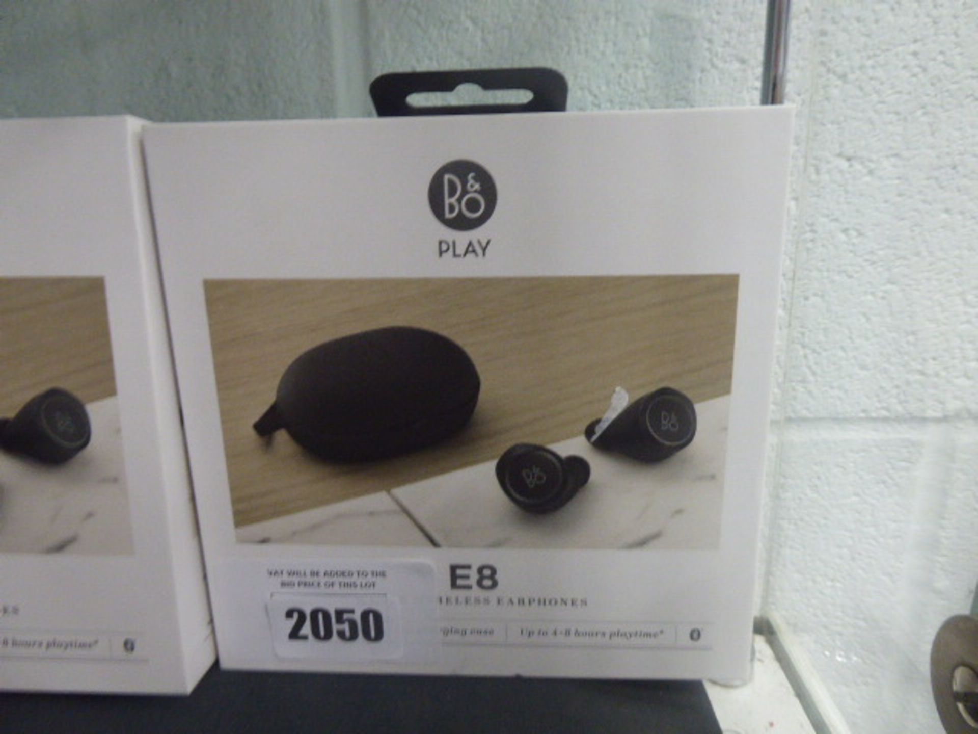 Bang & Olufsen Beoplay B8 wireless earphones with spare eartips, charging case and box