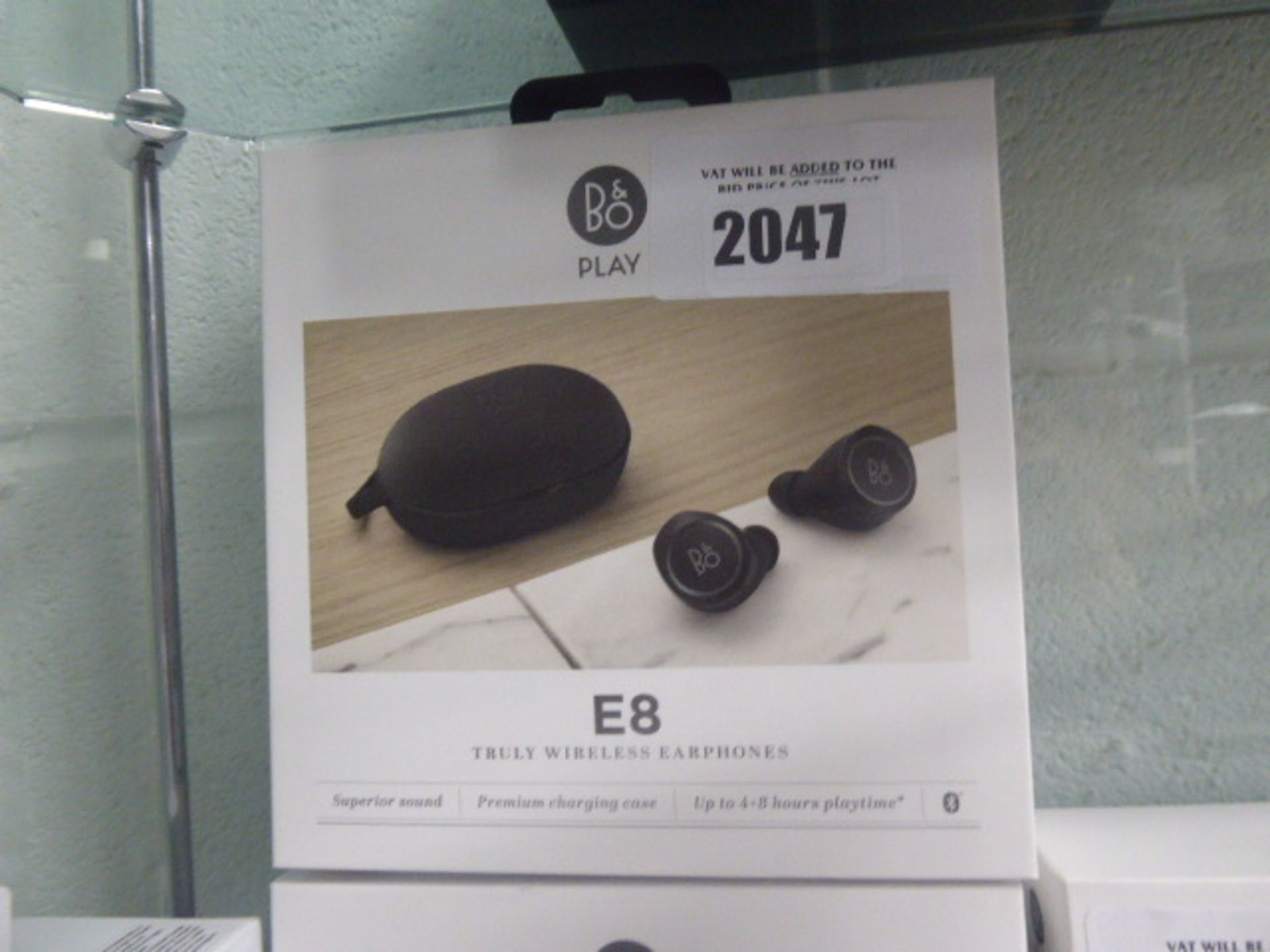 Bang & Olufsen Beoplay B8 wireless earphones with spare eartips, charging case and box