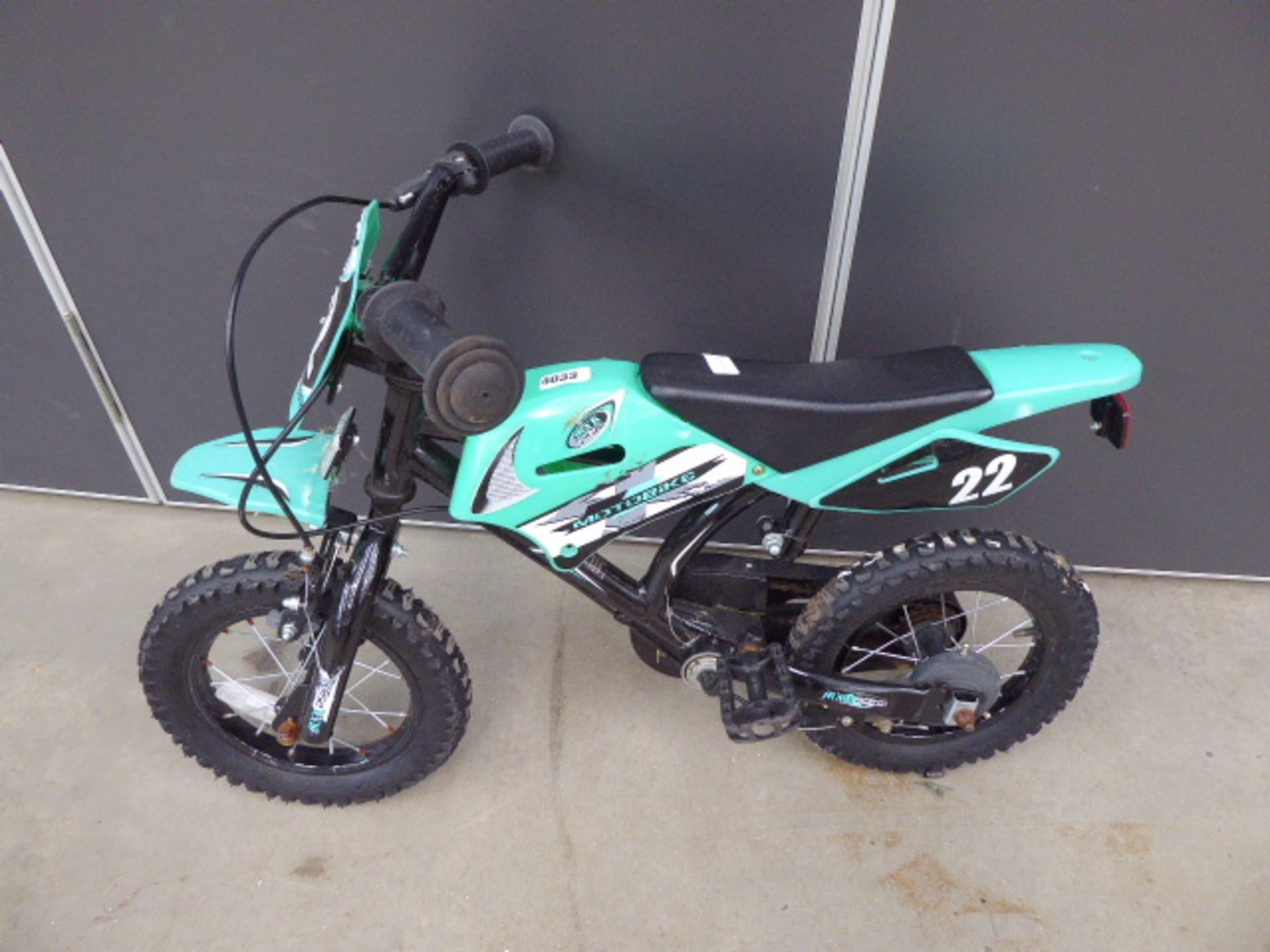 4032 Small green motorcycle-style childs bike