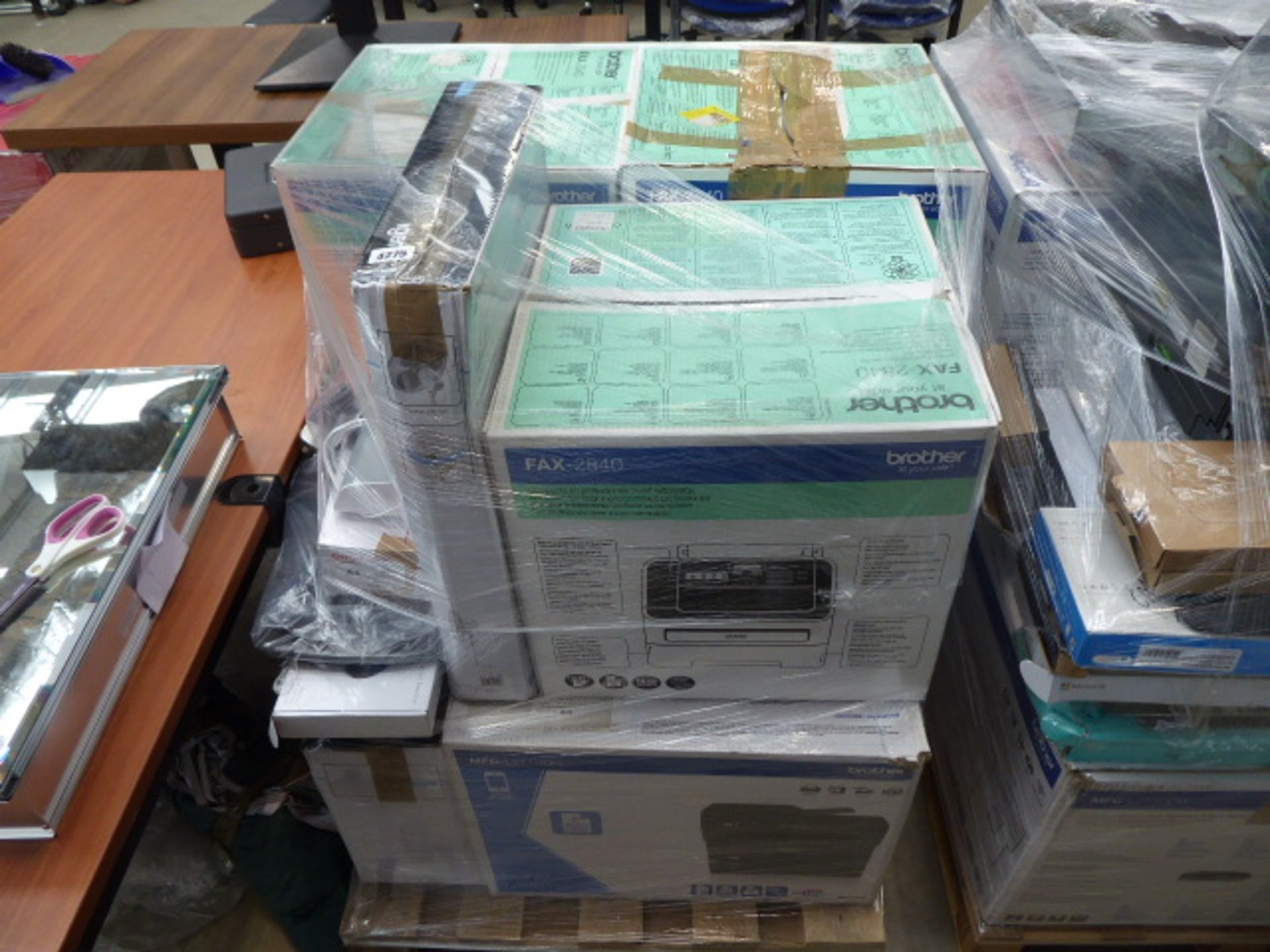 Pallet of assorted items including printers, laminators, fans, keyboards, etc